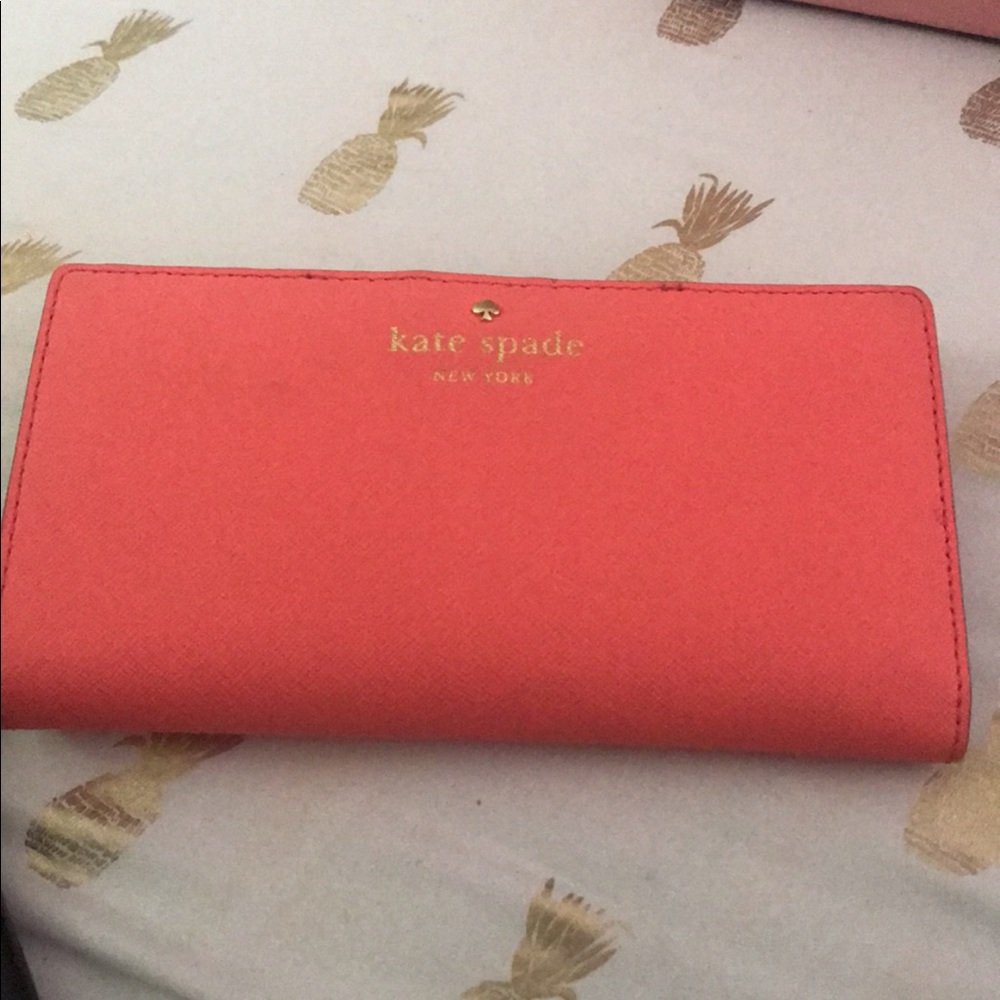 Beautiful Coral kate spade wallet.
